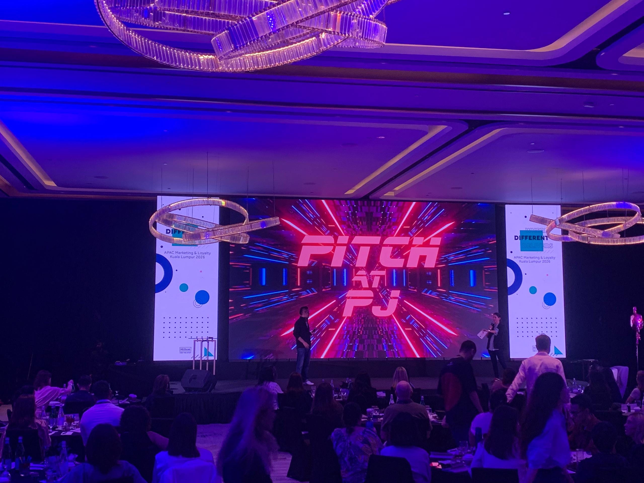 APAC marketing conference with a large LED stage and full audience
